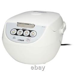 Microcomputer Controlled Rice Cooker, 5.5 Cups A MORE UNIQUE EXPERIENCE